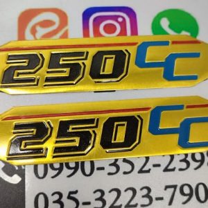 آرم (مارک) برجسته قاب بغل موتور سیکلت هندا 250 چسبی طلایی (جفت)